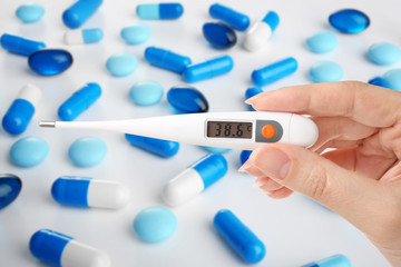 Blue pills on white background