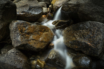 Naklejka na ściany i meble Small Cascade of Water Among Rocks at Base of Bridalveil Creek Falls - Yosemite