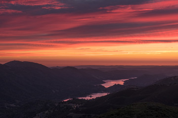 Stunning Mountain Sunset With Pink Clouds and Don Pedro Lake Reflection