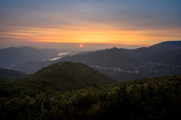 View of Sunset Haze and windy Yosemite Highway 120, After a Distant Wildfire