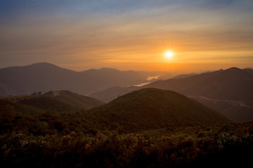 Hazy Sunset Over the Foothills and Don Pedro Reservoir, Taken From Priest Grade Road