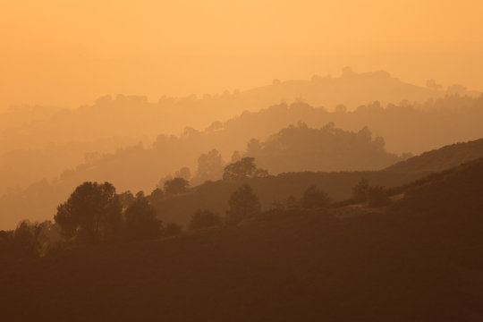 Orange Forest Fire Haze in Closeup Ridges of the Sierra Foothills