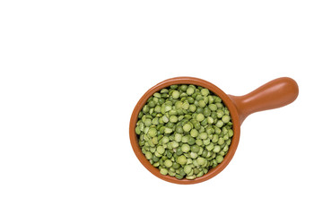Dry  green peas in a bowl isolated on white background.