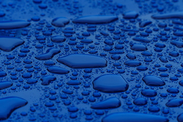 Water Drops on Blue Metallic Paint
