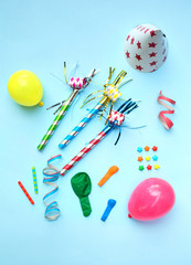 Birthday party items on a blue background