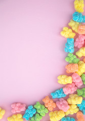 Fototapeta na wymiar Gummy bears on pink background