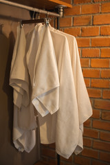 White towel hangs on the rail.