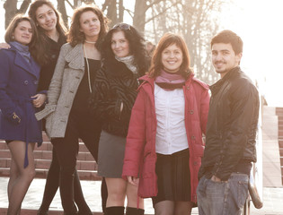 group of students standing on the street