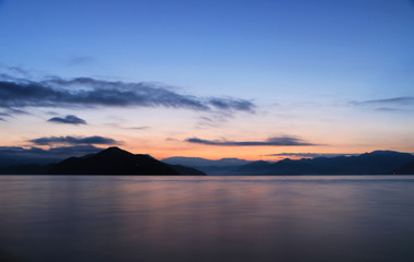Fototapeta na wymiar Morning light in lugu lake, lijiang, yunnan, China