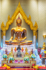 The Golden Buddha gold statue located in the temple of Wat Traimit, Bangkok, Thailand.