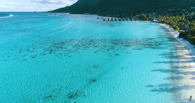 hotel with overwater bungalow in a lagoon in French Polynesia