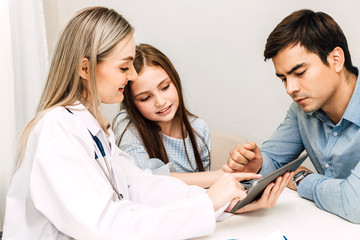 Doctor consulting and check up information with little girl in hospital.A little girl has sick.healthcare and medicine