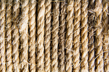Natural twisted braided and coiled hemp rope for fastening. strength and security.