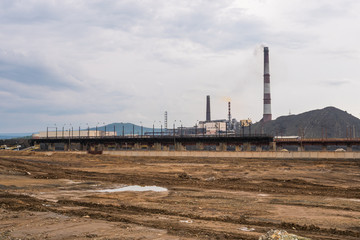 Obraz premium Metallurgical works with smoke. Industrial architecture
