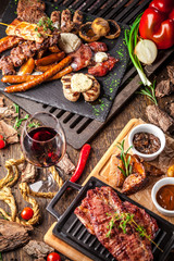 Arabian cuisine in Dubai. A roasted beef steak, with sauce, on a wooden board. The concept is a beautiful serve in the restaurant. Background image. Copy space, selective focus