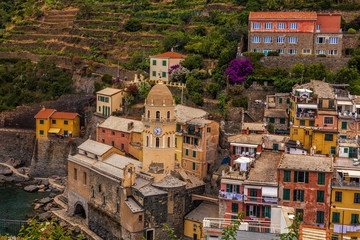 Fototapeta na wymiar Looking out towards a close-up view of Vernazza, one of the towns of the Cinque Terre along Italy's Ligurian coast