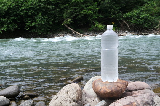 Picture of a plastic bottle with water.