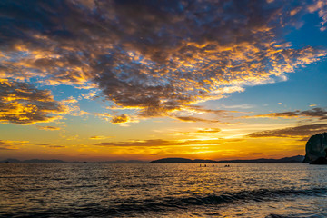 Obraz premium Sunset at beach sea sky clouds twilight time