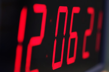 Red digital Timer, numbers counting.