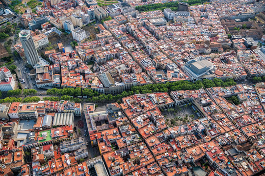 Old town of Barcelona with La Rambla street, Spain. Aerial helicopter view