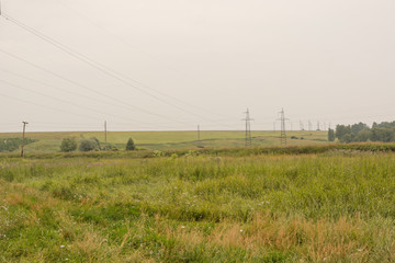 The high-voltage line passes through the field