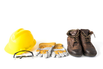 Construction site safety. Personal protective equipment on white background