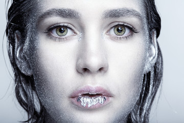Closeup beauty portrait of young woman face