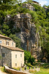 Fototapeta na wymiar Houses of the small medieval village Labeaume, built on the rocky gorges of the Ardeche in France
