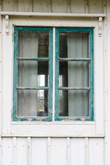 Fototapeta na wymiar Window in need of painting