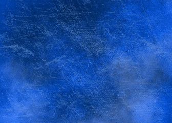 Blue abstract textured background to the point with spots of paint. Blank background design banner.