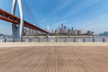 Panoramic skyline and modern business office buildings with empty road,empty concrete square floor