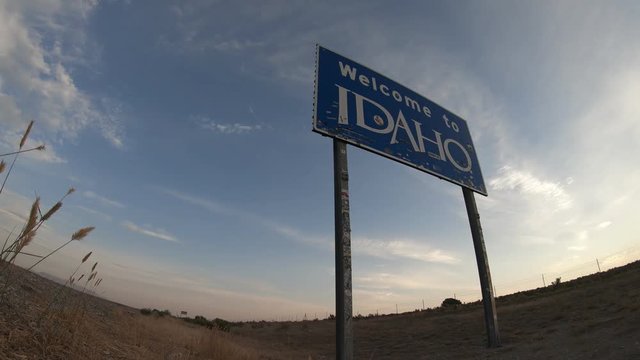 Idaho State Welcome Sign (Time Lapse) on interstate 84 Leaving Utah.