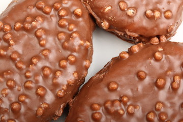 Chocolate candy with Rice Krispies Cereal on a white