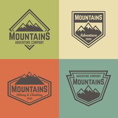 Mountains four vector colored vintage badges
