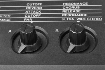 Control knobs of synthesizer close-up