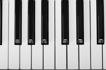 Naklejka premium Piano keyboard of synthesizer close-up. Top view
