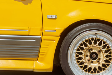 Detail of vintage yellow sport car