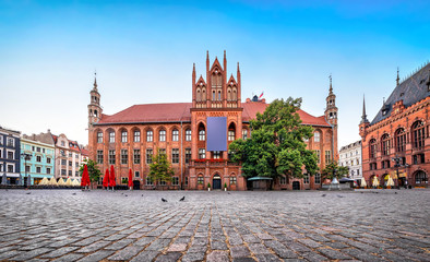 Gothic facade of Old Town Hall of Torun located on Old Market square, Poland