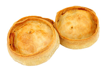 Traditional Scotch meat pies isolated on a white background © philip kinsey