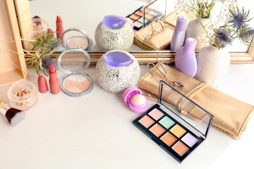 Set of decorative cosmetics on dressing table