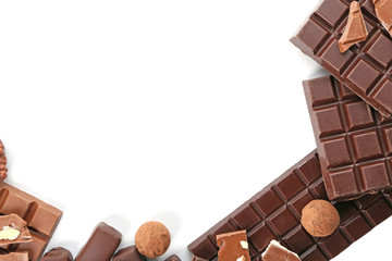Delicious chocolate with candies on  white background