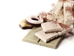 Delicious chocolate with cinnamon on white background