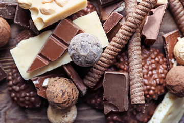 Delicious chocolate with candies, closeup