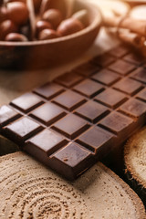 Chocolate bar on wooden stumps