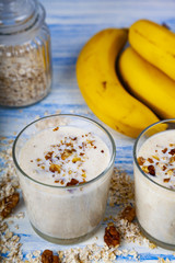 Smoothies with a banana, walnut and oat flakes