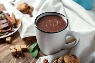 Deurstickers Cup of hot chocolate on wooden table © Pixel-Shot