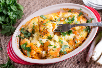 Baked casserole with a pumpkin and cheese