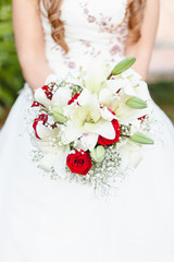 Bride holding a beautiful bouquet on a wedding day
