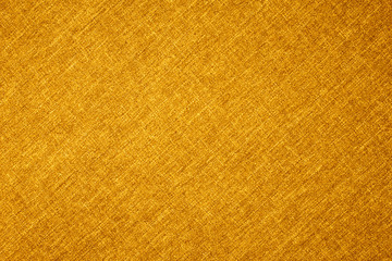 Orange canvas texture with visible fibers. Textile background