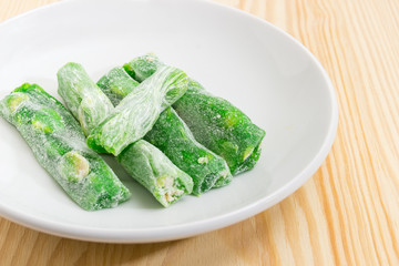 Turkish delight with mint on saucer closeup at selective focus